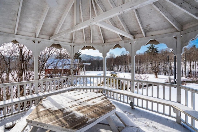 view of snow covered deck