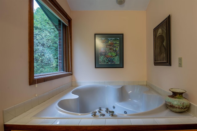 full bathroom featuring a whirlpool tub