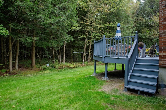 view of yard featuring stairway and a wooden deck