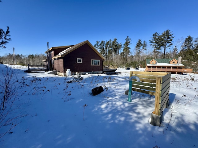 view of yard covered in snow