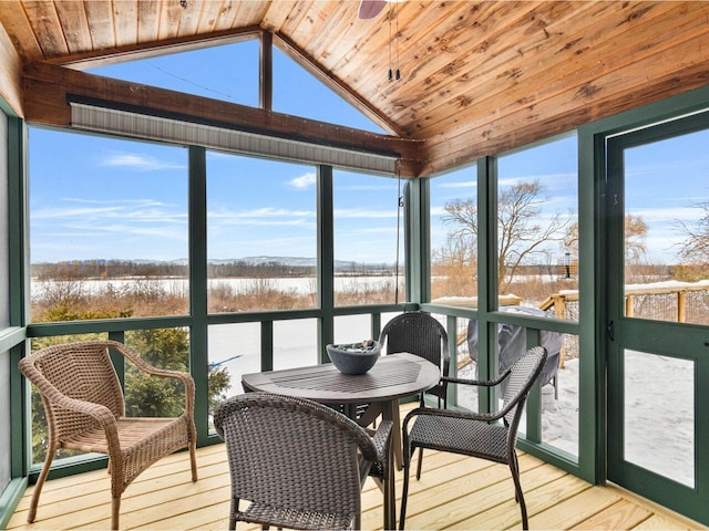 sunroom featuring wood ceiling and vaulted ceiling