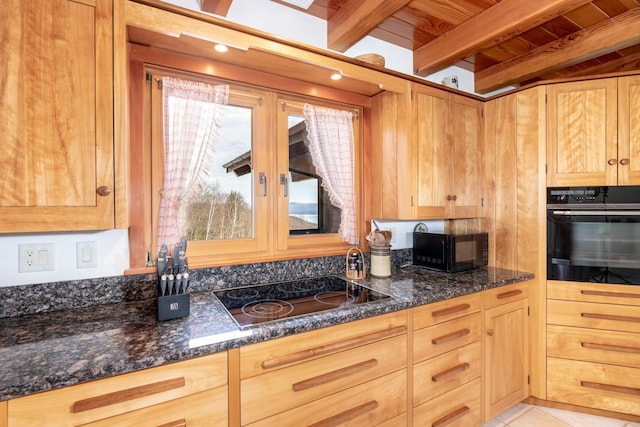 kitchen featuring light tile patterned floors, wooden ceiling, dark stone countertops, beamed ceiling, and black appliances