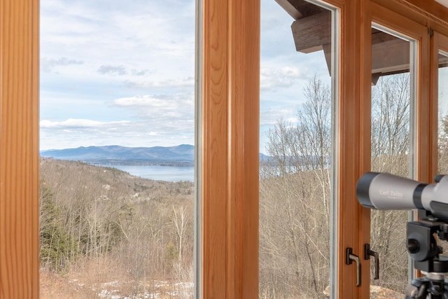 interior space featuring a water and mountain view