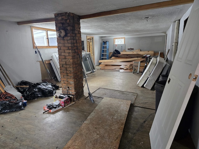 interior space featuring a textured ceiling