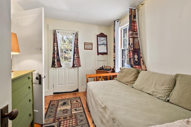 bedroom with light wood-style floors