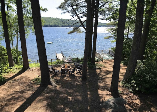 view of water feature featuring an outdoor fire pit