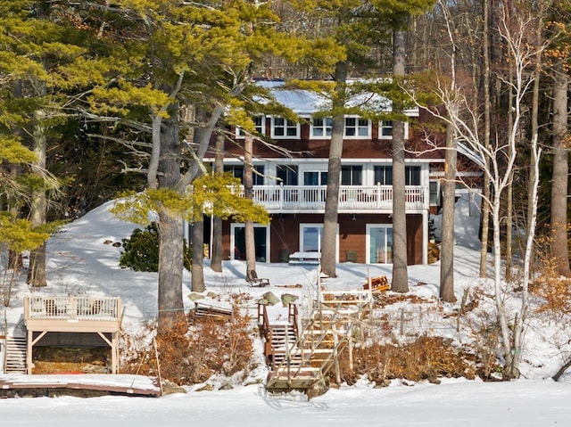 view of front of property featuring stairs