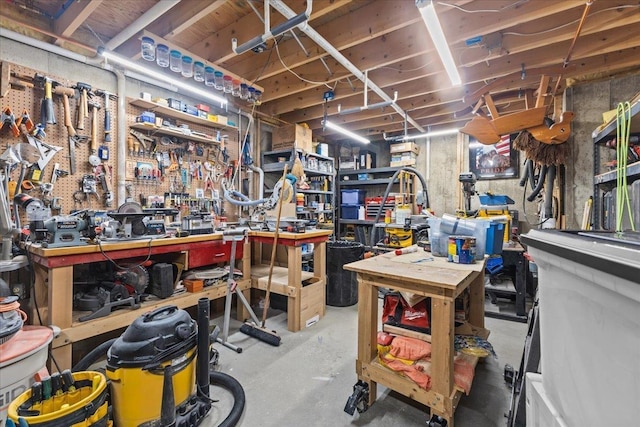 interior space with concrete floors and a workshop area