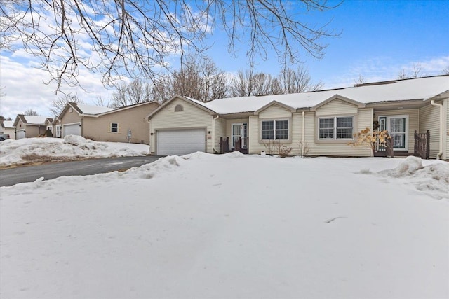 ranch-style house featuring an attached garage