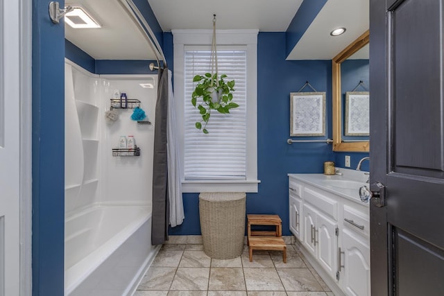 bathroom with tub / shower combination and vanity