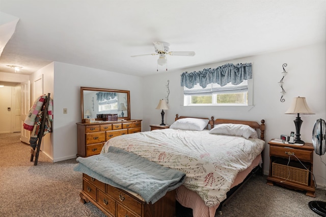 bedroom featuring light carpet, ceiling fan, and baseboards