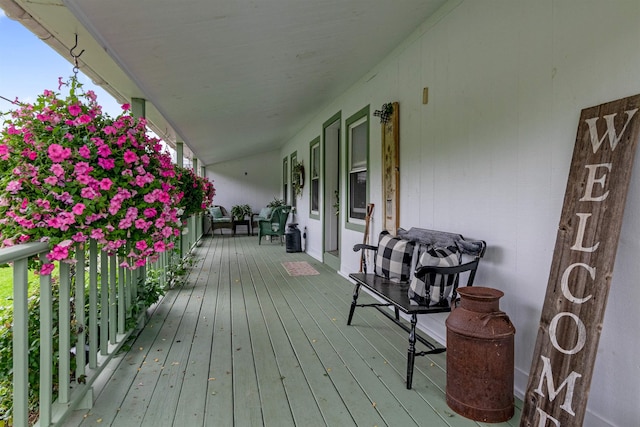 deck featuring a porch