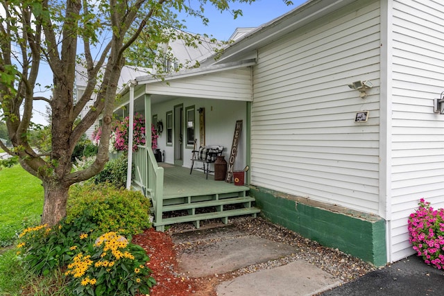 entrance to property with a porch