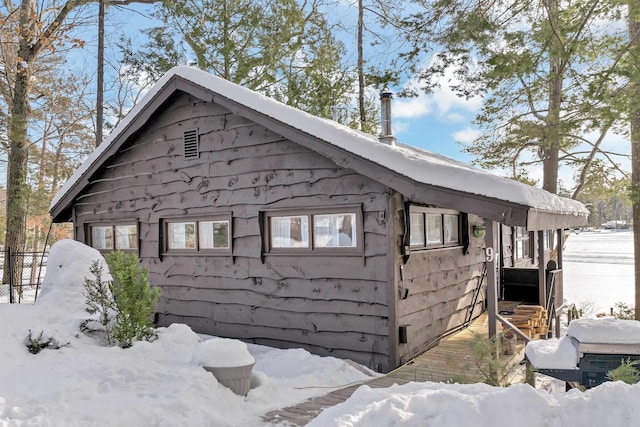 view of snow covered property