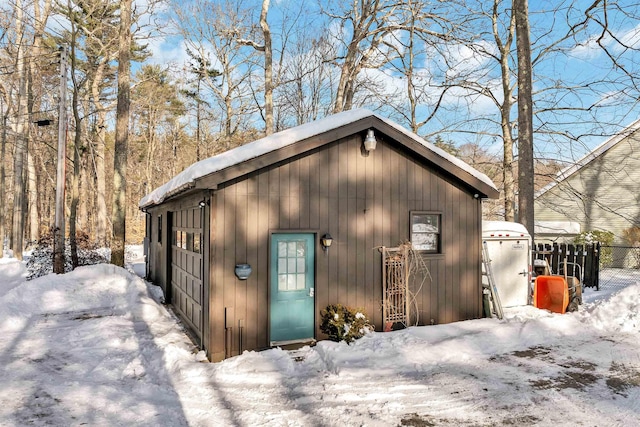 view of snow covered garage