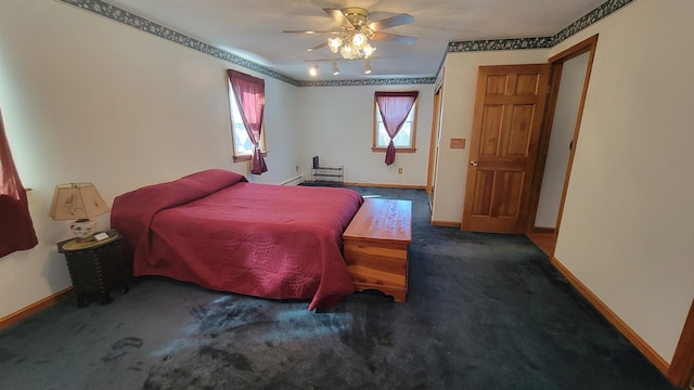 unfurnished bedroom with a ceiling fan, baseboards, and carpet flooring