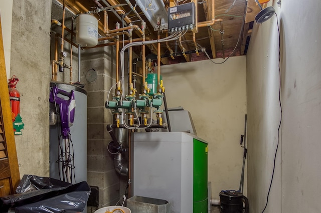 utility room featuring a heating unit and gas water heater