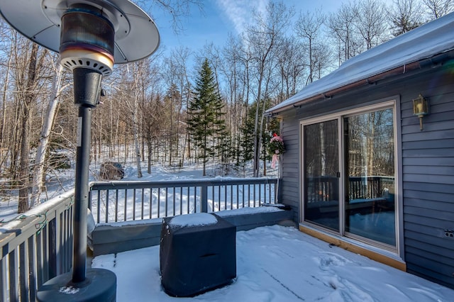 snow covered deck with area for grilling