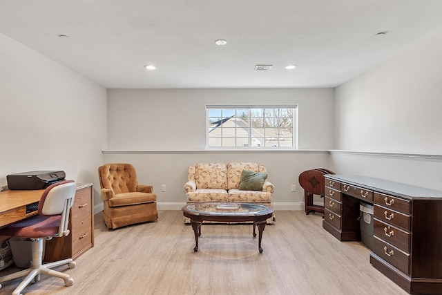 home office featuring baseboards, recessed lighting, visible vents, and light wood-style floors