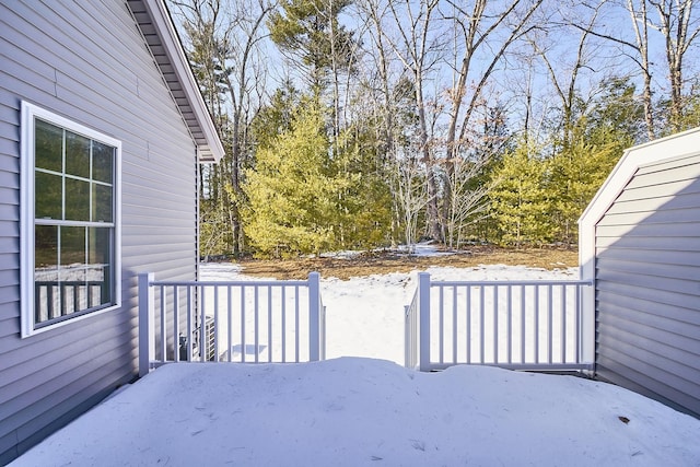 view of snow covered deck