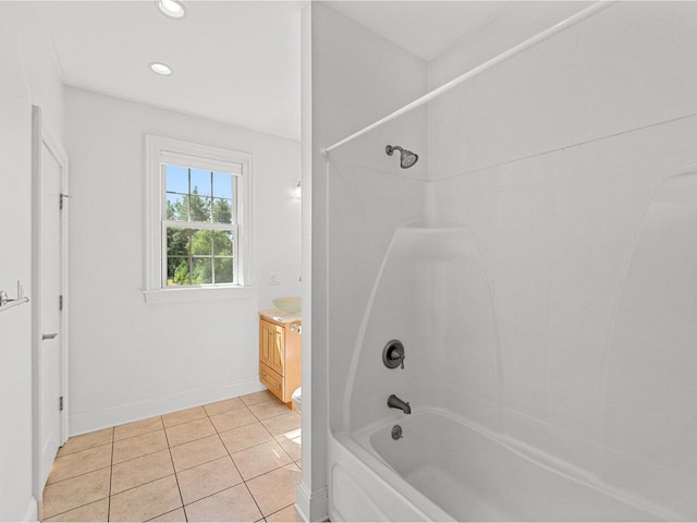 full bath featuring baseboards, tile patterned flooring, vanity, washtub / shower combination, and recessed lighting