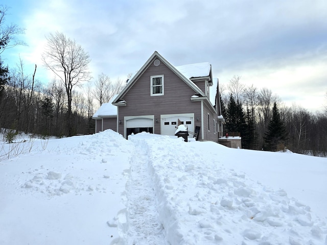 view of snow covered property