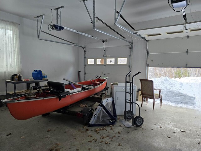 96 Mason Dr, Milan, NH 03588 - garage featuring a garage door opener