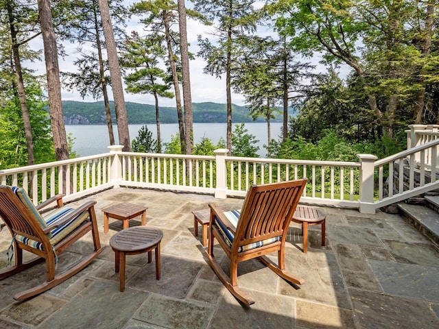 view of patio / terrace featuring a water view