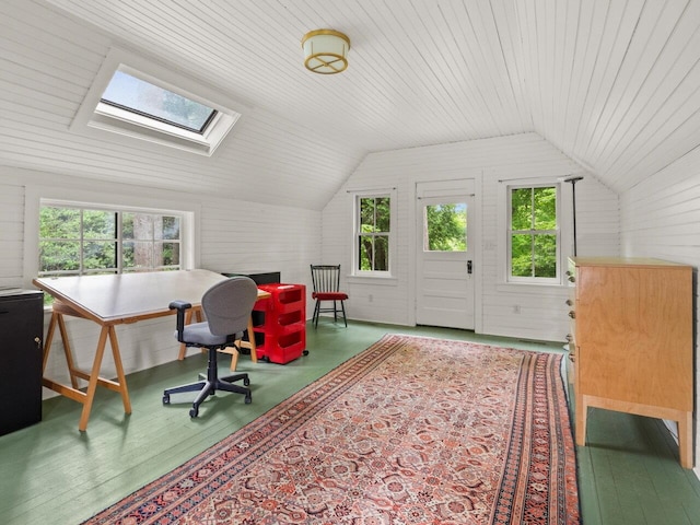 office area featuring vaulted ceiling with skylight and wood finished floors