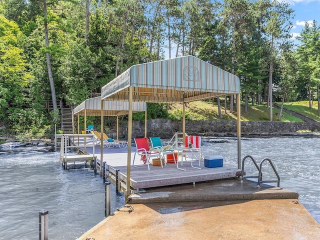 view of dock with a water view and stairway