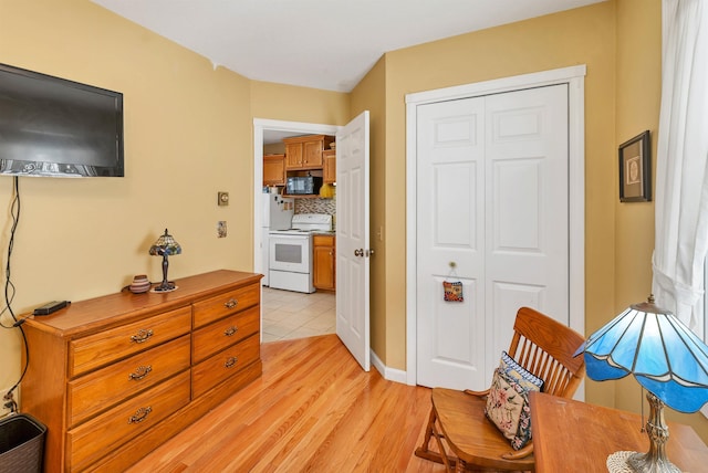 sitting room featuring light wood-type flooring