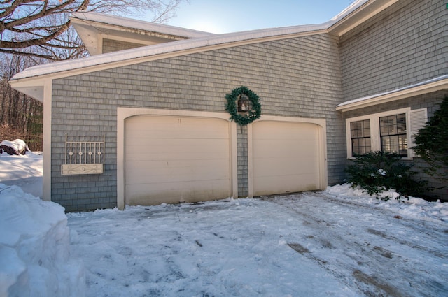 view of snow covered garage