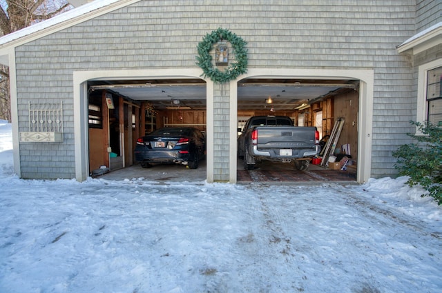 view of snow covered garage