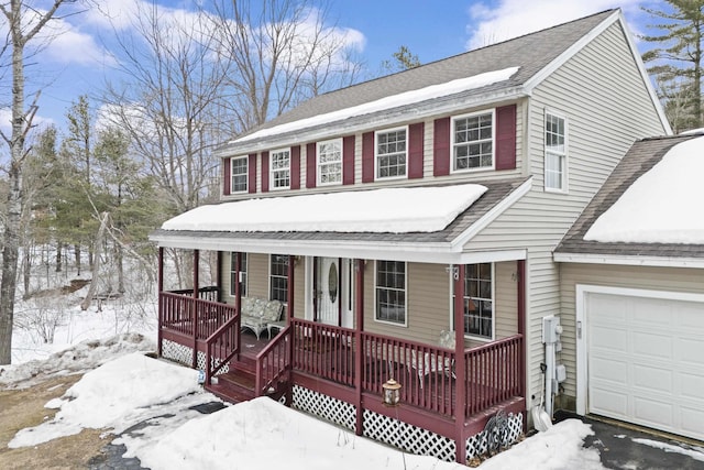 view of front of house with a porch and a shingled roof