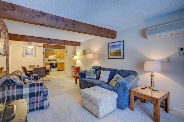 living area with light carpet, a textured ceiling, beam ceiling, and a wall mounted air conditioner