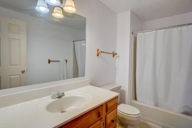 full bath with shower / bath combo with shower curtain, a textured ceiling, toilet, and vanity