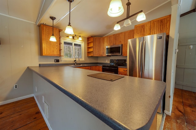 kitchen with open shelves, appliances with stainless steel finishes, dark wood-type flooring, a sink, and a peninsula