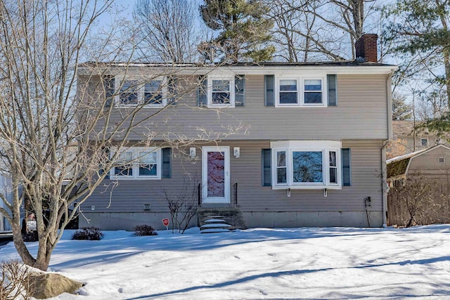 colonial home with a chimney