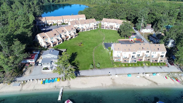 aerial view featuring a water view and a residential view