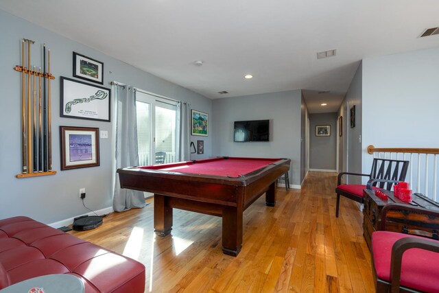 game room featuring light wood-style floors, pool table, visible vents, and baseboards