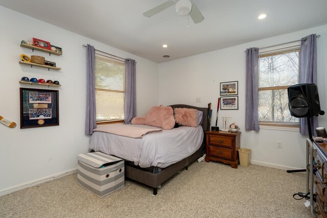 bedroom with light carpet, ceiling fan, recessed lighting, and baseboards