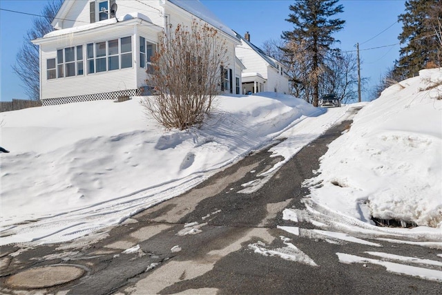 view of snow covered property