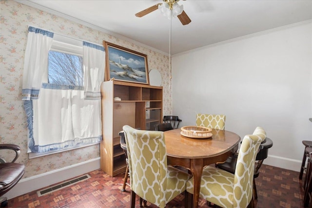 dining space with wallpapered walls, baseboards, visible vents, brick floor, and crown molding