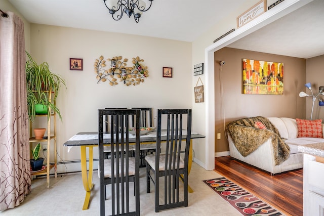 dining room featuring baseboards