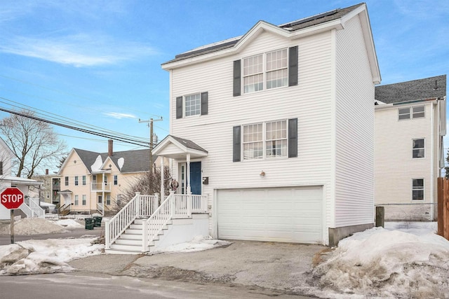 view of front of property featuring an attached garage