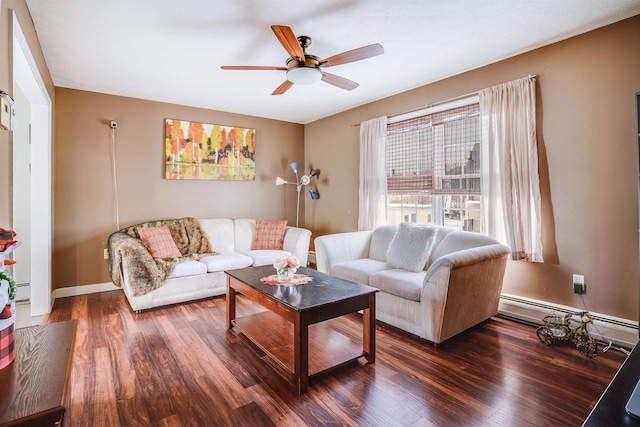 living room with baseboards, a ceiling fan, baseboard heating, and wood finished floors