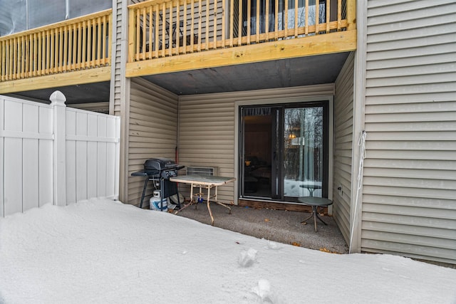 view of patio featuring grilling area and a balcony