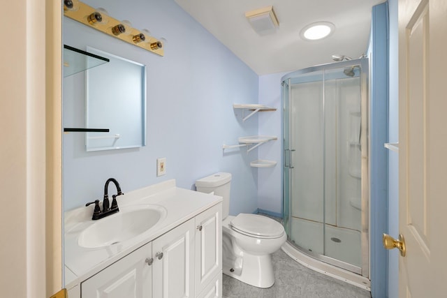 full bathroom with toilet, a stall shower, and vanity