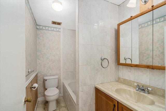 full bath featuring toilet, visible vents, tile walls, and vanity