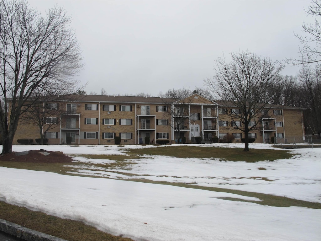 view of snow covered property